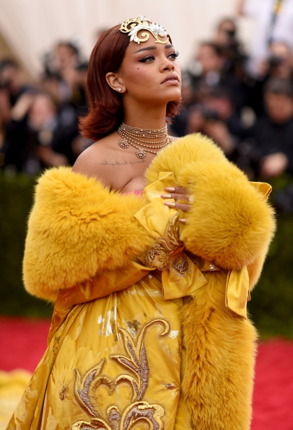 Rihanna basically won the Met Gala in this yellow cape-gown by Chinese couturier Guo Pei. RiRi was one of the only celebs to wear an actual Chinese designer on the red carpet. There's also something amazing about wearing a gown so big and beautiful that it requires three grown men to stoop and scurry along after you, fixing the train as you majestically sail past on the red carpet. | Photo from Getty Images 2015