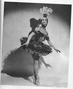 Janet Collins, 1917-2003, broke many color barriers and lived to see almost an entire century of dance's evolution. From the African American Registry (http://www.aaregistry.org/historic_events/view/janet-collins-prima-ballerina): From New Orleans, Louisiana, she moved with her family to Los Angeles as a young girl, attending Los Angeles City College and the Los Angeles Art Center School. As an accomplished painter, she was able to finance her relocation to New York to pursue a career in dance. In 1941, she performed with the new, but world-renowned Black dance troupe formed and directed by Katherine Dunham. At the age of fifteen, Collins successfully auditioned for the Ballet Russe de Monte Carlo at the Philharmonic, but after being told she would have to paint her face white to perform, she declined the offer. Having told her aunt what happened, she was advised, "You get back to the barre and start your City exercises. Don’t try to be good, be excellent." In 1949, Collins made her New York debut in a solo concert. As a prima ballerina in 1951, she became the first Black artist to perform on the stage of the Metropolitan Opera House in New York. Starring in the 1951 production of Cole Porter’s Out of This World, Collins won the Donaldson Award, signifying the best dancer on Broadway. She remained with the Met until 1954, dancing in Carmen, Aida, La Gioconda, and Samson and Delilah, after which she toured the United States and Canada in solo dance concerts. Having taught at several colleges and dance institutions in New York and California, she retired and resided in Seattle. Janet Collins died in June 2003 in Forth Worth, Texas.